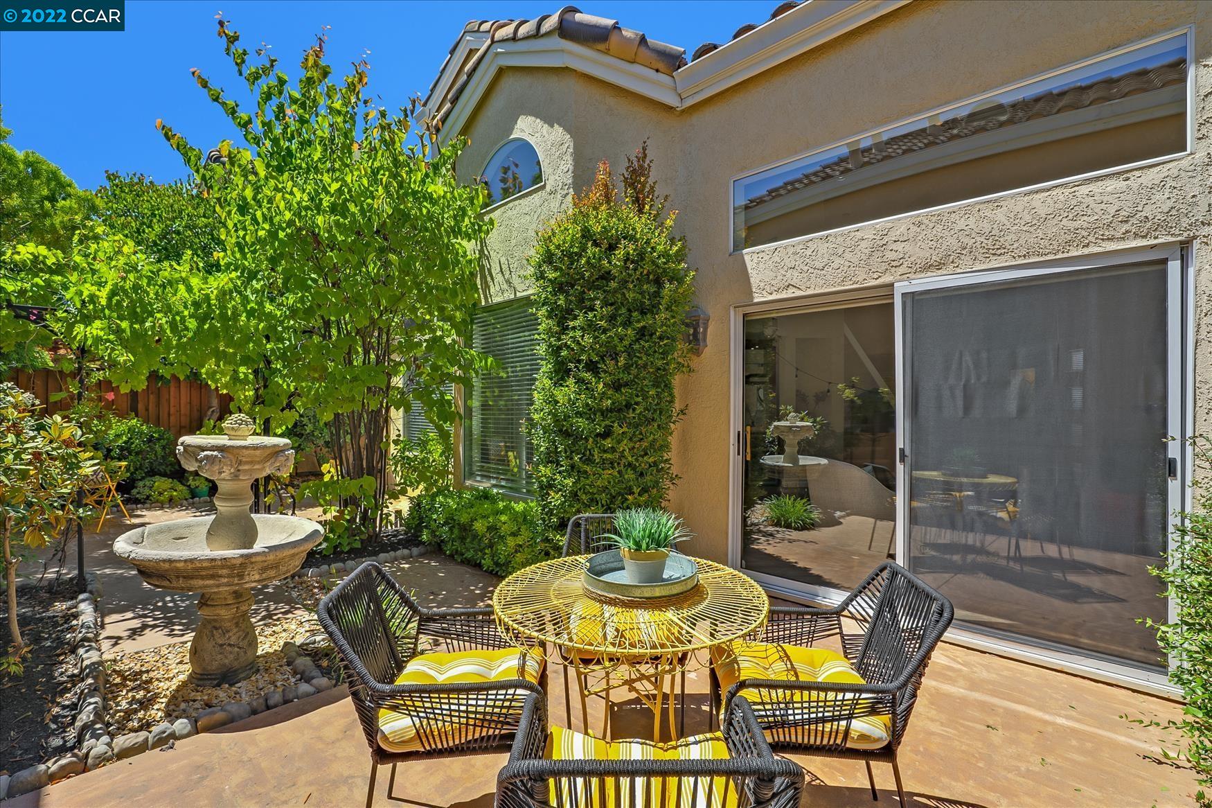 388 Catalan Way San Ramon, CA 94582 - Photo 45 of 52 a view of a chair and table in backyard of the house
