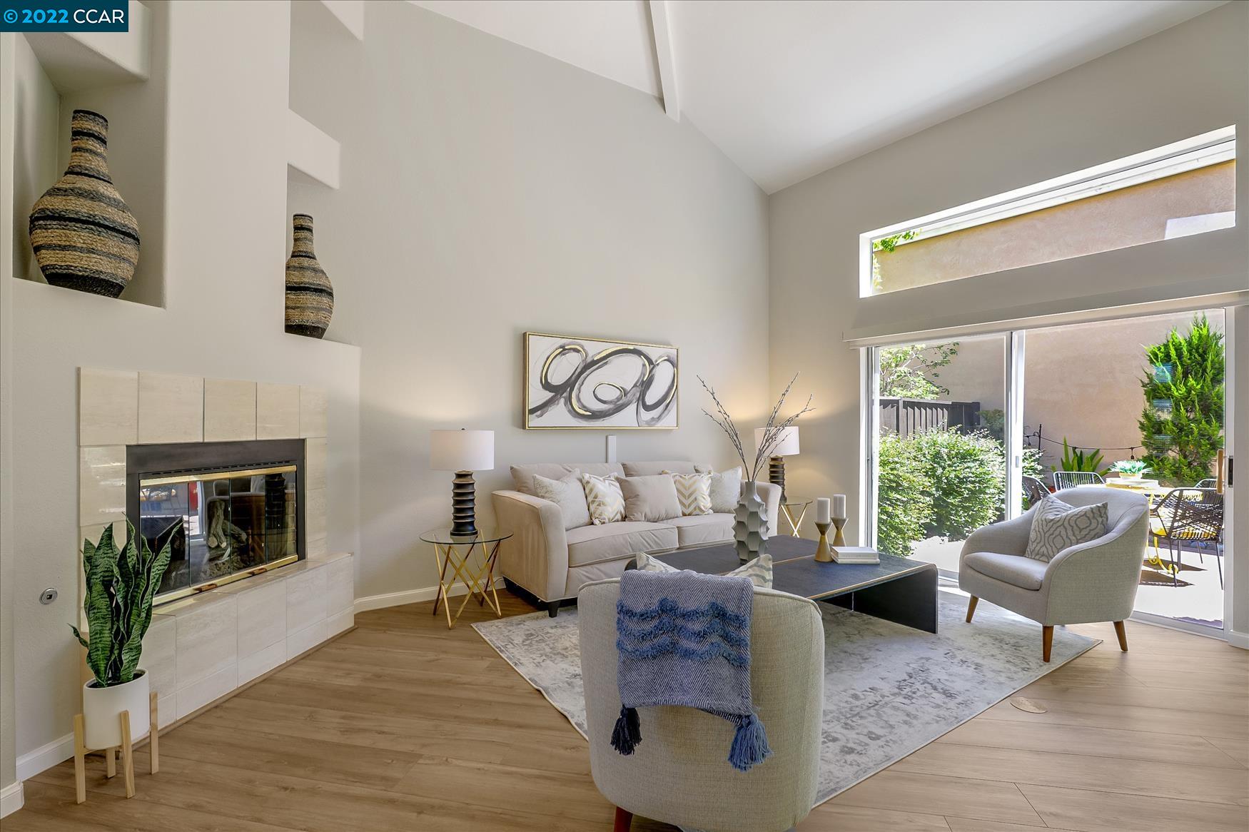 388 Catalan Way San Ramon, CA 94582 - Photo 5 of 52 a living room with furniture and a fireplace
