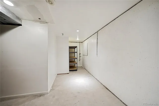 a utility room with cabinets washer and dryer
