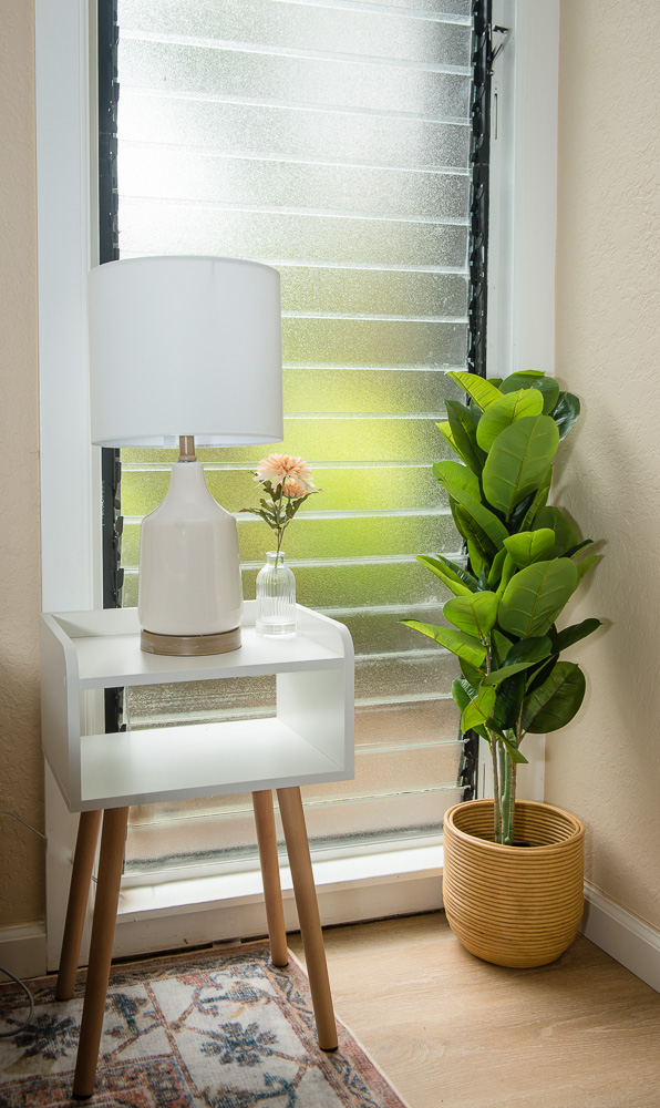 3920 Wyllie Road, Unit 9A Princeville, HI 96722 - Photo 18 of 30 a view of entryway with a vase and flowers on it