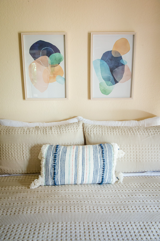 3920 Wyllie Road, Unit 9A Princeville, HI 96722 - Photo 24 of 30 a view of a bedroom with a large window