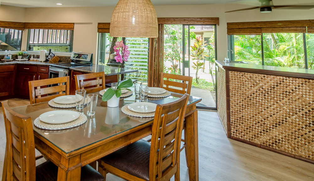 3920 Wyllie Road, Unit 9A Princeville, HI 96722 - Photo 8 of 30 a view of a dining room with furniture window and outside view