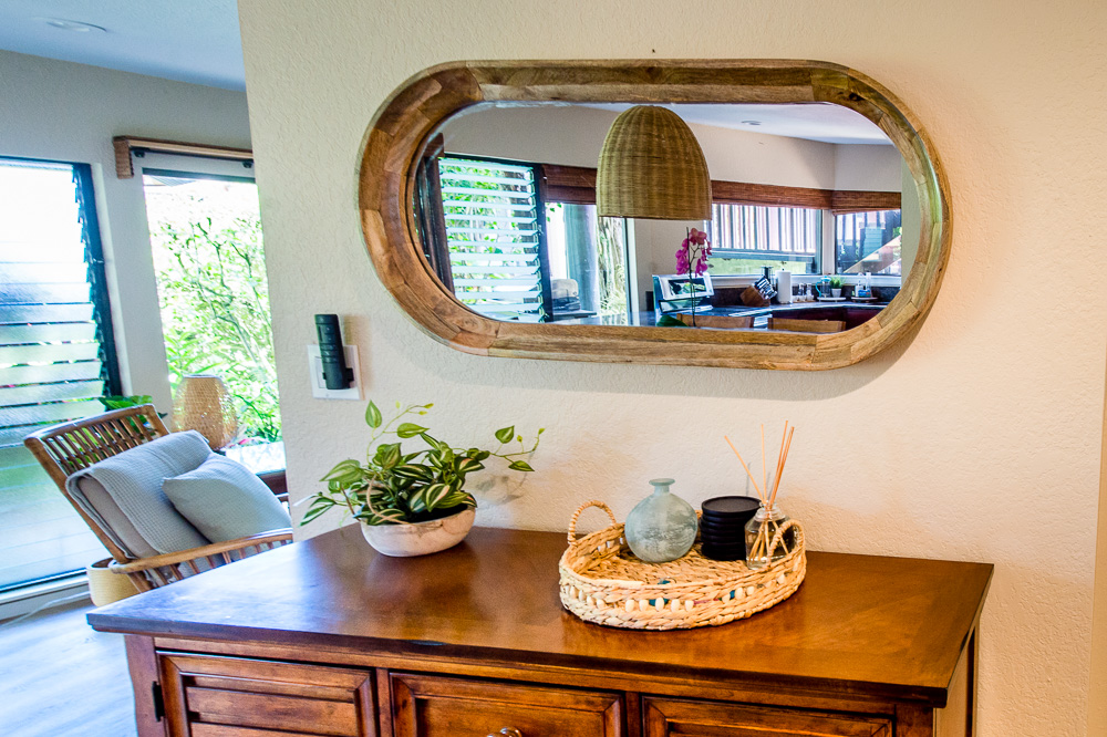 3920 Wyllie Road, Unit 9A Princeville, HI 96722 - Photo 10 of 30 a living room with furniture and a potted plant