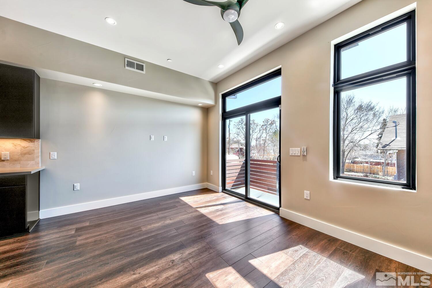 106 High Street Reno, NV 89502 - Photo 12 of 21 an empty room with wooden floor and windows