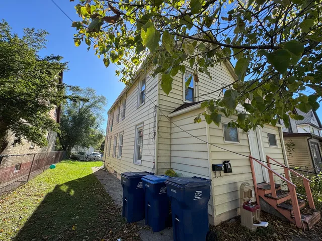 a view of a backyard with plants