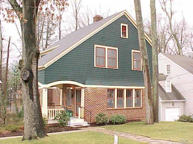 520 Gardner Street Raleigh, NC 27607 - Photo 1 of 1 a front view of a house with a yard