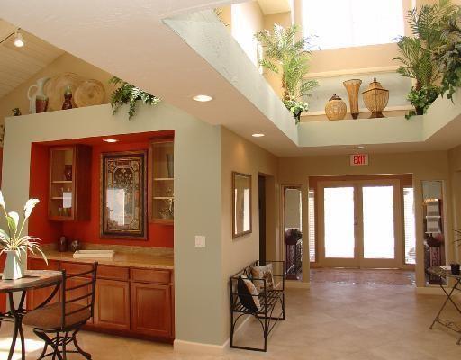 801 Lyons Road, Unit 19108 Coconut Creek, FL 33063 - Photo 2 of 42 a view of a livingroom with furniture and a large window
