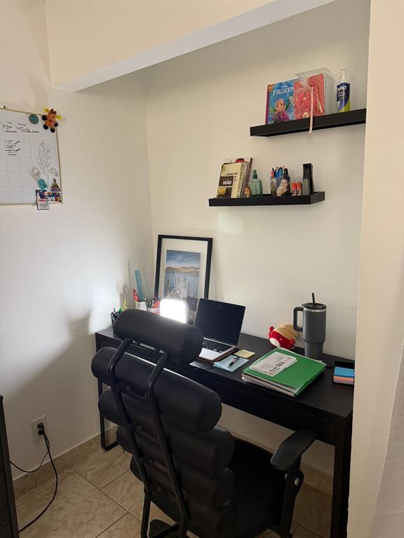 801 Lyons Road, Unit 19108 Coconut Creek, FL 33063 - Photo 10 of 42 a living room with a couch