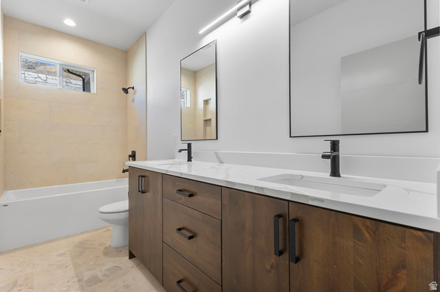 710 East Mountain Road North Ogden, UT 84414 - Photo 20 of 36 Bathroom featuring double vanity, shower / bath combination, and recessed lighting