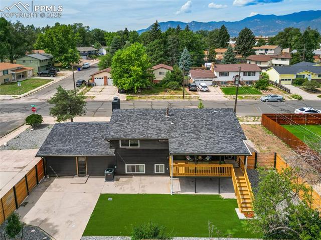 4020 Maxwell Road Colorado Springs, CO 80909 - Photo 35 of 38 Large fully fenced backyard.
