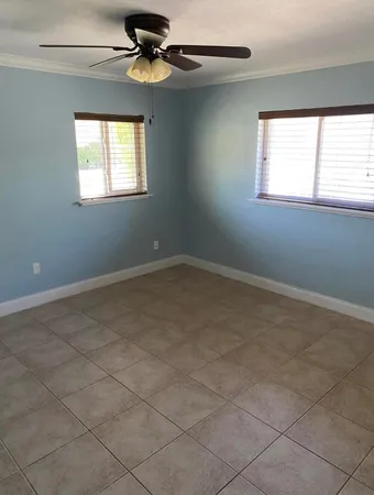 an empty room with windows