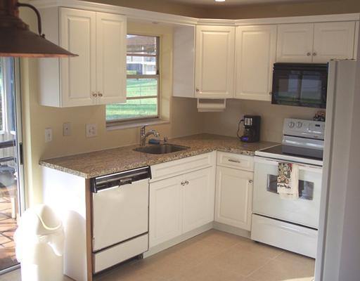 129 Village Circle Jupiter, FL 33458 - Photo 4 of 10 KITCHEN 1