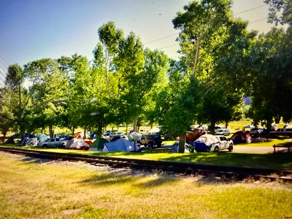 a view of mountain view with wooden fence