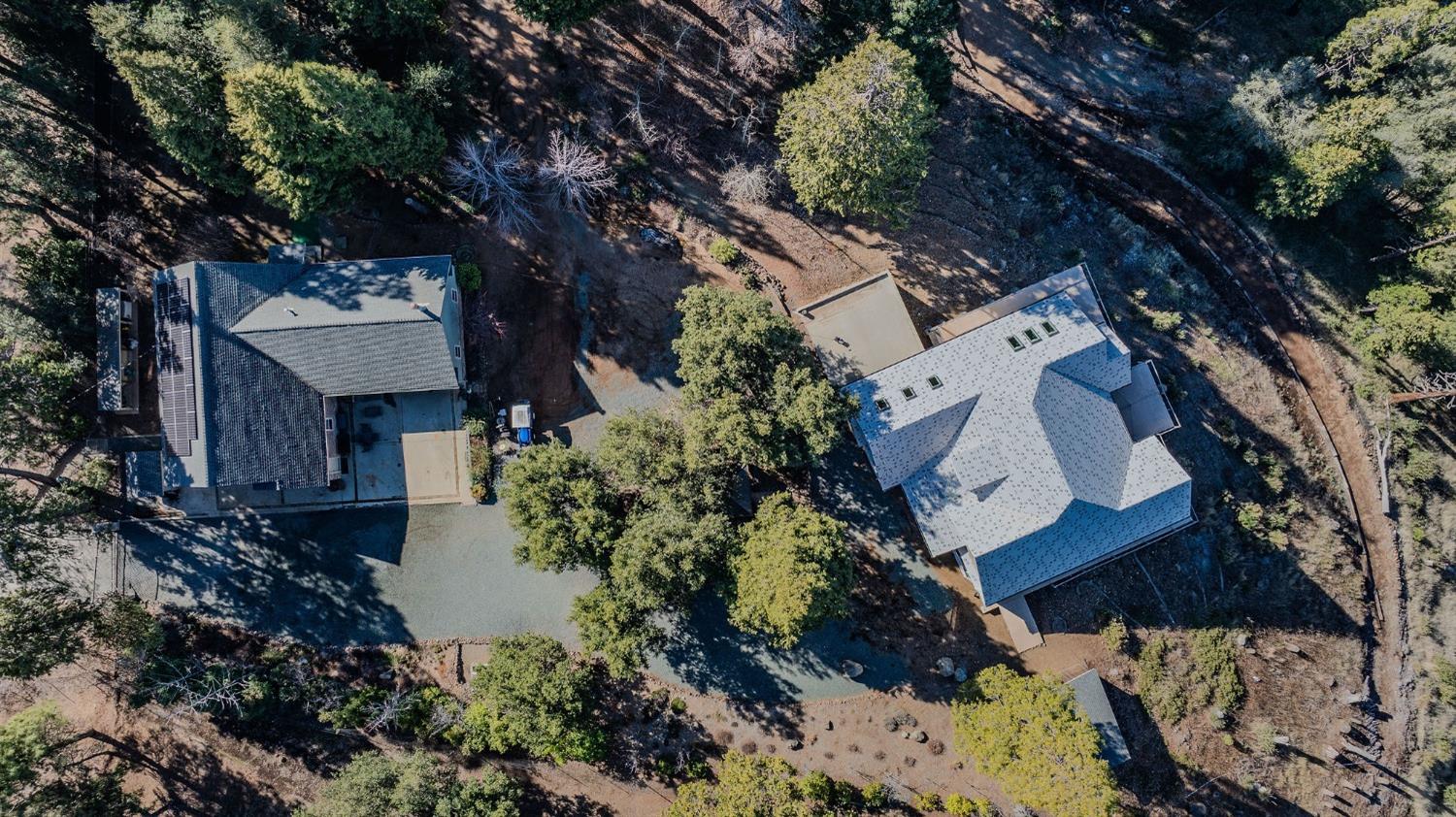 a view of a house with a tree