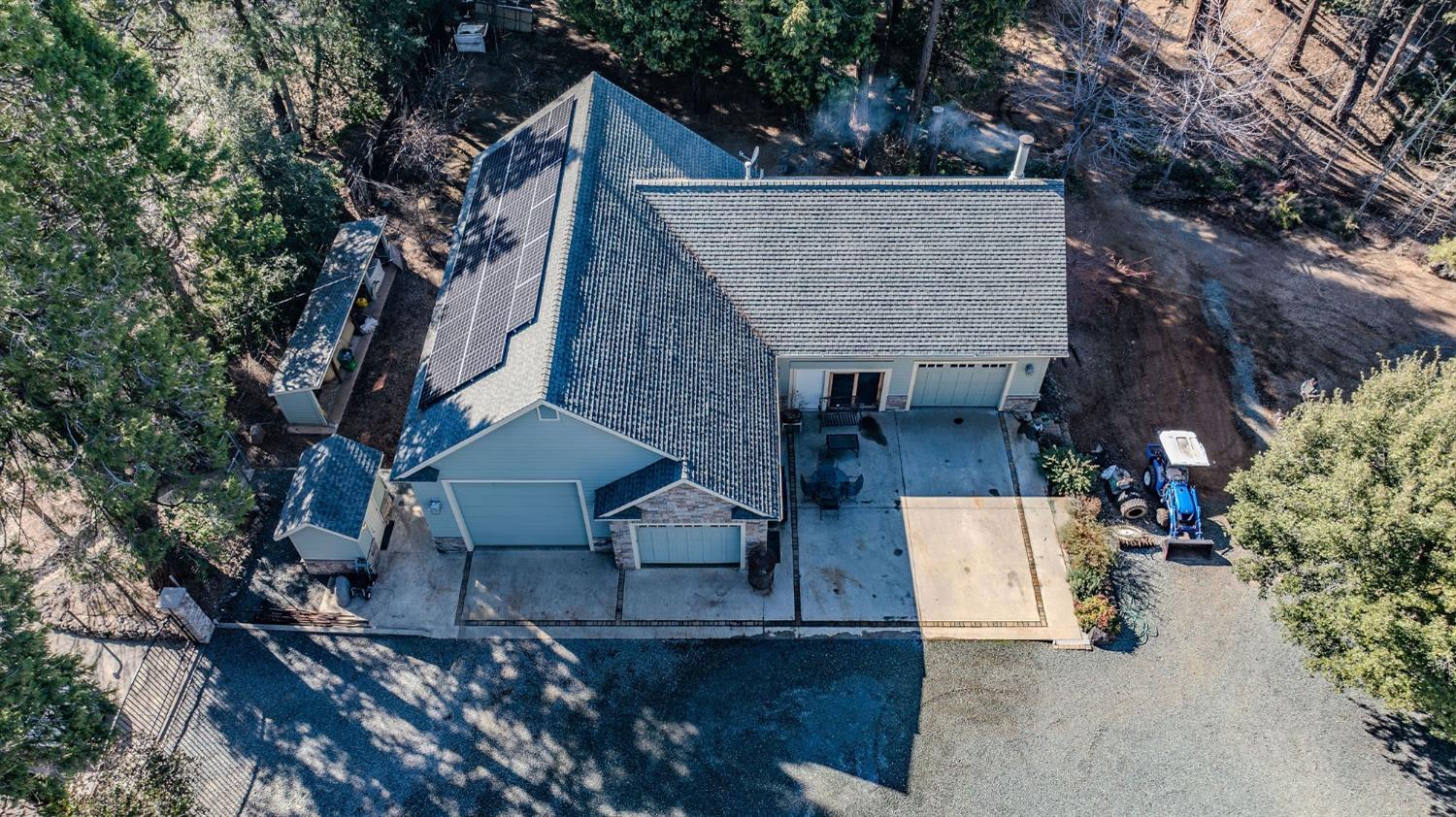 24985 Shake Ridge Road Volcano, CA 95689 - Photo 30 of 92 front view of a house with a bench
