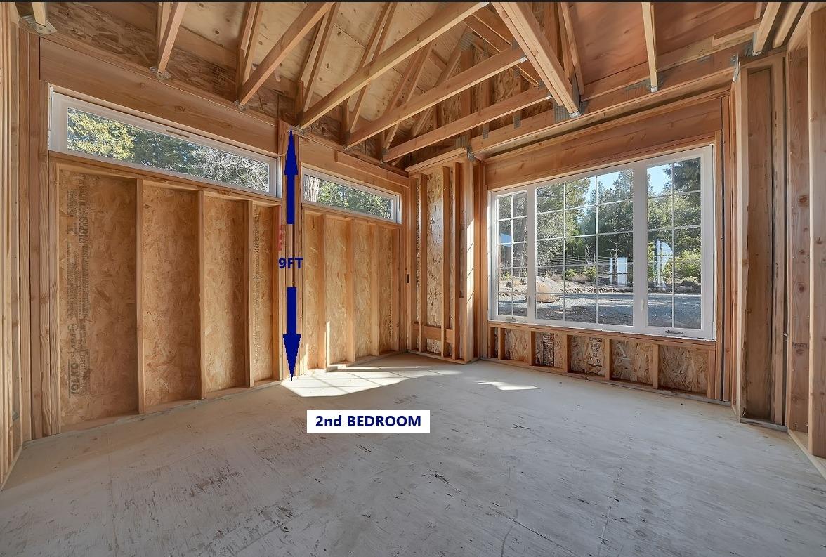 24985 Shake Ridge Road Volcano, CA 95689 - Photo 60 of 92 a view of a room with large windows and furniture