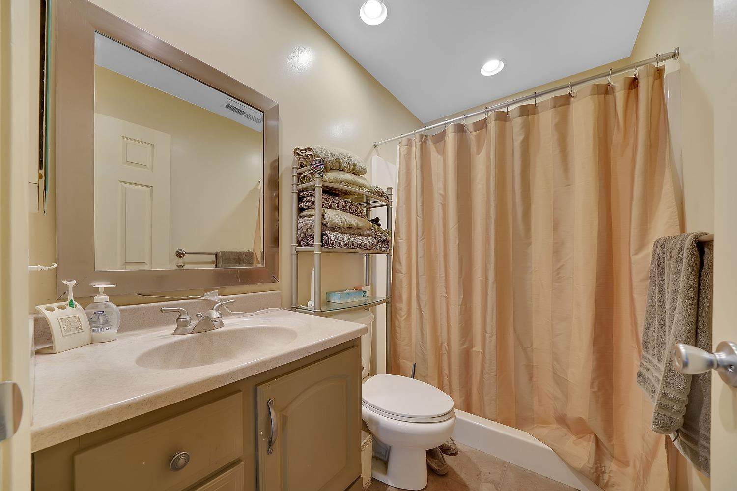 24985 Shake Ridge Road Volcano, CA 95689 - Photo 86 of 92 a bathroom with a sink toilet and shower