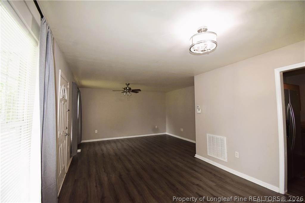 6158 Lonestar Road Fayetteville, NC 28303 - Photo 5 of 20 a view of empty room with wooden floor