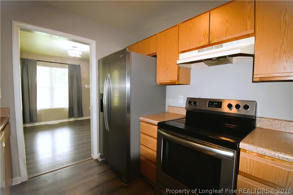 6158 Lonestar Road Fayetteville, NC 28303 - Photo 7 of 20 a view of kitchen with washer and dryer