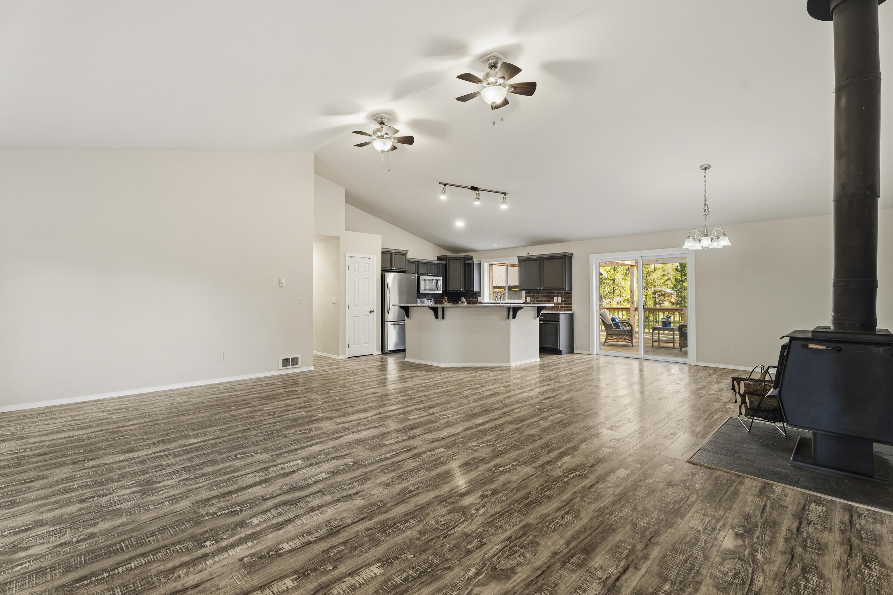 16050 Dick Road La Pine, OR 97739 - Photo 5 of 59 a view of a kitchen with a sink and a refrigerator