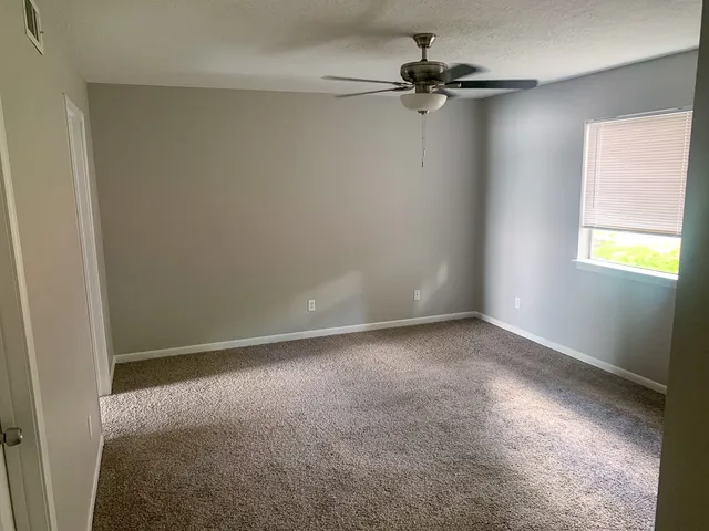 a view of a window in an empty room