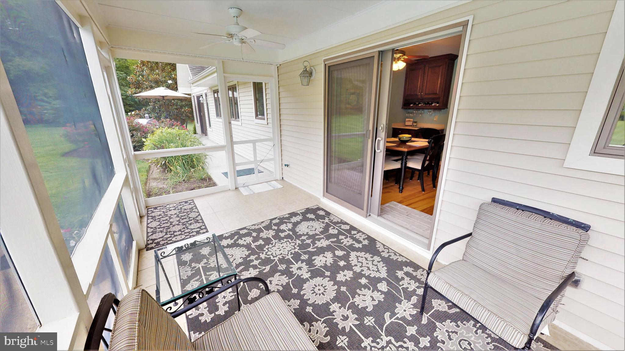 25972 Goose Neck Road Royal Oak, MD 21662 - Photo 19 of 58 Screened porch off breakfast area of the kitchen