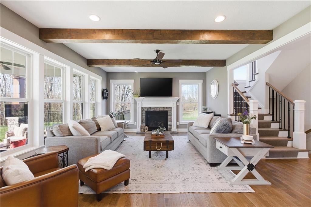 159 Davidson Road Mars, PA 16046 - Photo 19 of 50 a living room with furniture and a fireplace