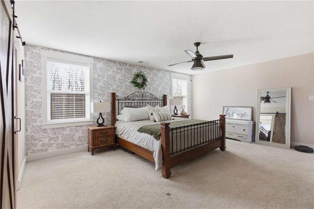 159 Davidson Road Mars, PA 16046 - Photo 31 of 50 a bedroom with a bed and a chandelier
