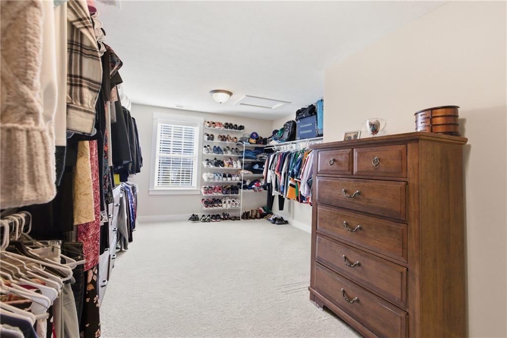 159 Davidson Road Mars, PA 16046 - Photo 32 of 50 a view of walk in closet with clothes and shoes