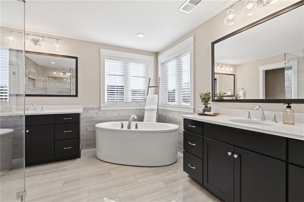 159 Davidson Road Mars, PA 16046 - Photo 33 of 50 a spacious bathroom with a tub sink double vanity granite and mirror
