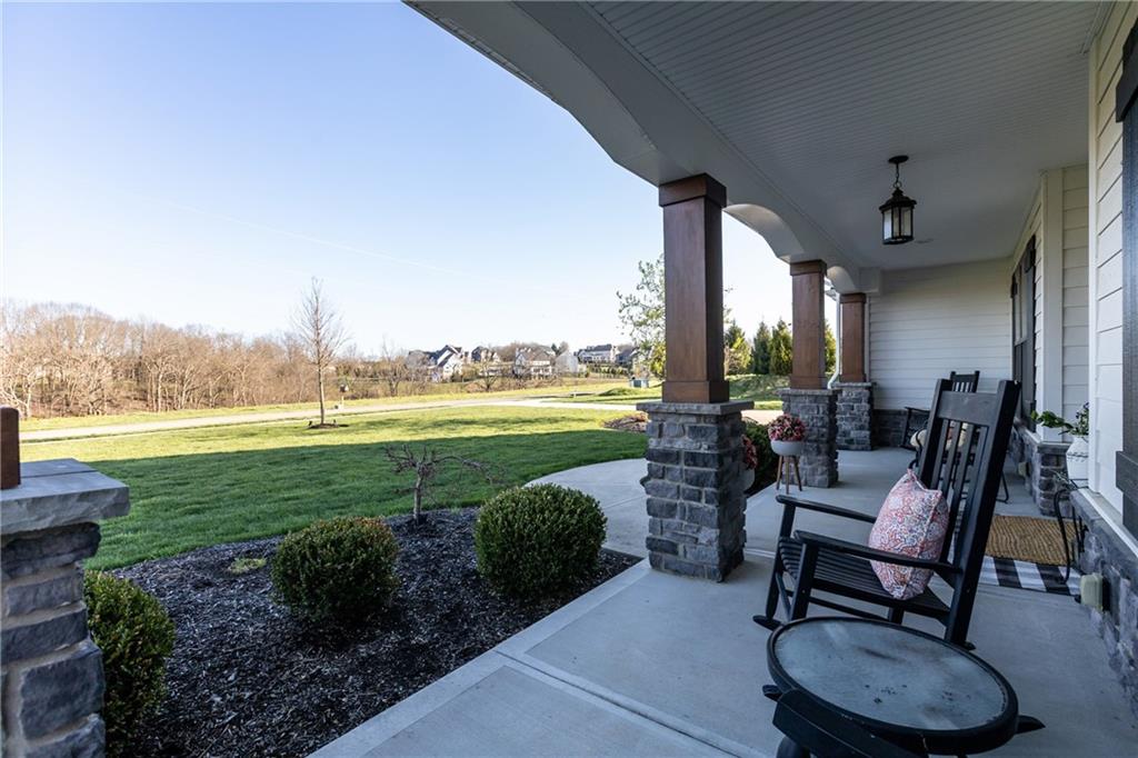 159 Davidson Road Mars, PA 16046 - Photo 5 of 50 a view of a chairs and table in patio with a lake view