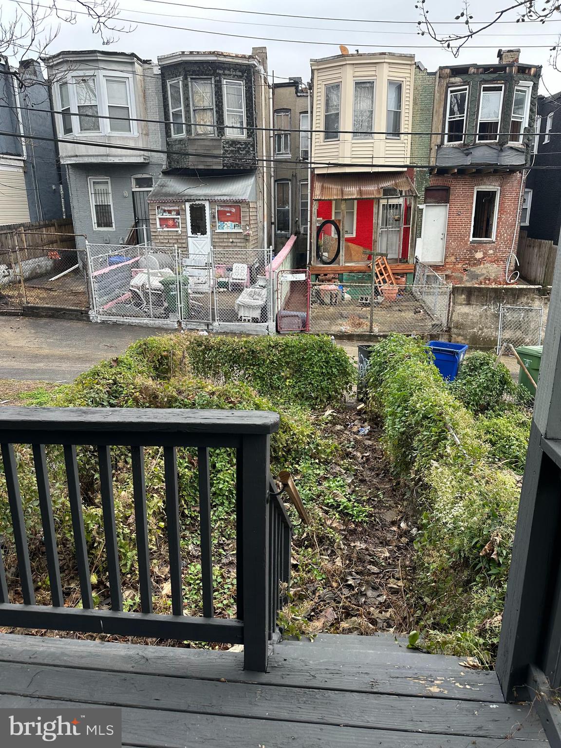 1707 North Dallas Street Baltimore, MD 21213 - Photo 12 of 12 a front view of a residential apartment building with glass windows