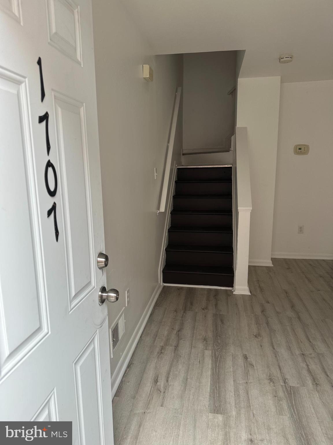 1707 North Dallas Street Baltimore, MD 21213 - Photo 2 of 12 a view of an entryway with staircase