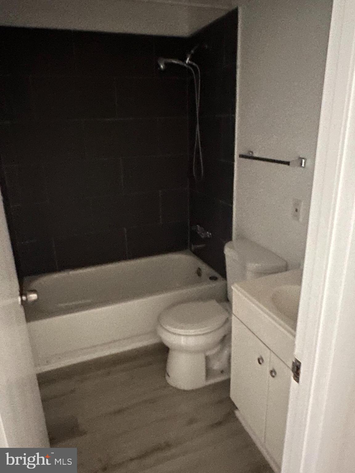 1707 North Dallas Street Baltimore, MD 21213 - Photo 8 of 12 a bathroom with a toilet and a shower