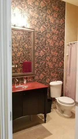 a bathroom with a sink and a toilet
