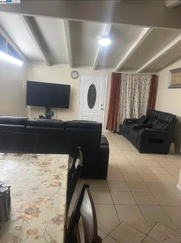 a kitchen with a sink and a stove top oven