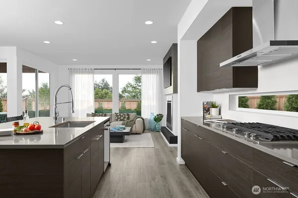 a very nice looking kitchen with a large window