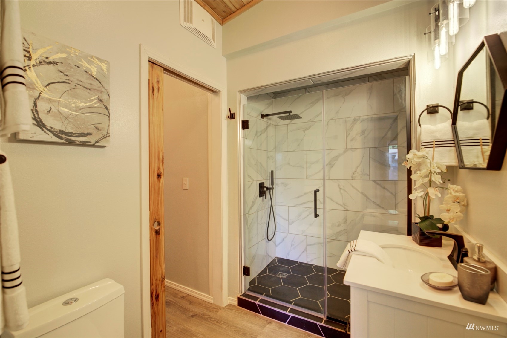 3612 Northeast 9th Street Renton, WA 98056 - Photo 16 of 23 a bathroom with a sink and a mirror