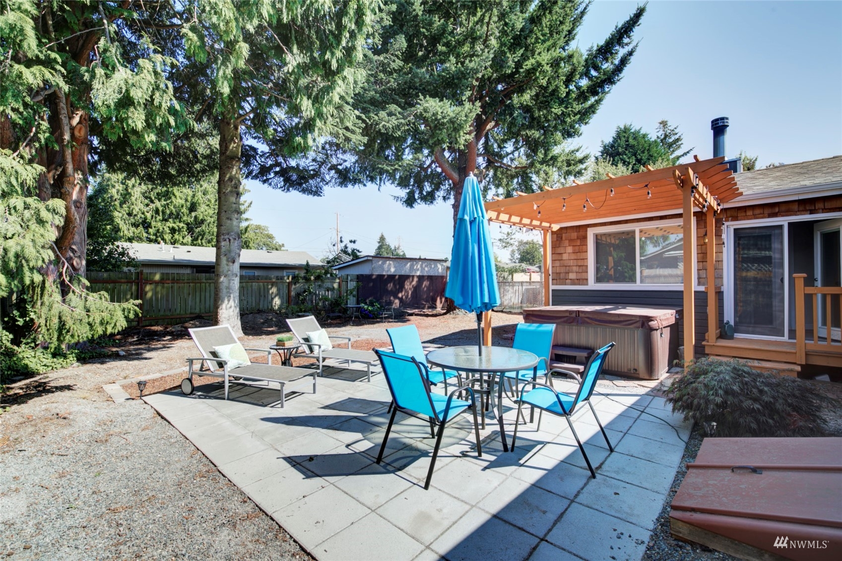 3612 Northeast 9th Street Renton, WA 98056 - Photo 21 of 23 a view of backyard of house with seating space