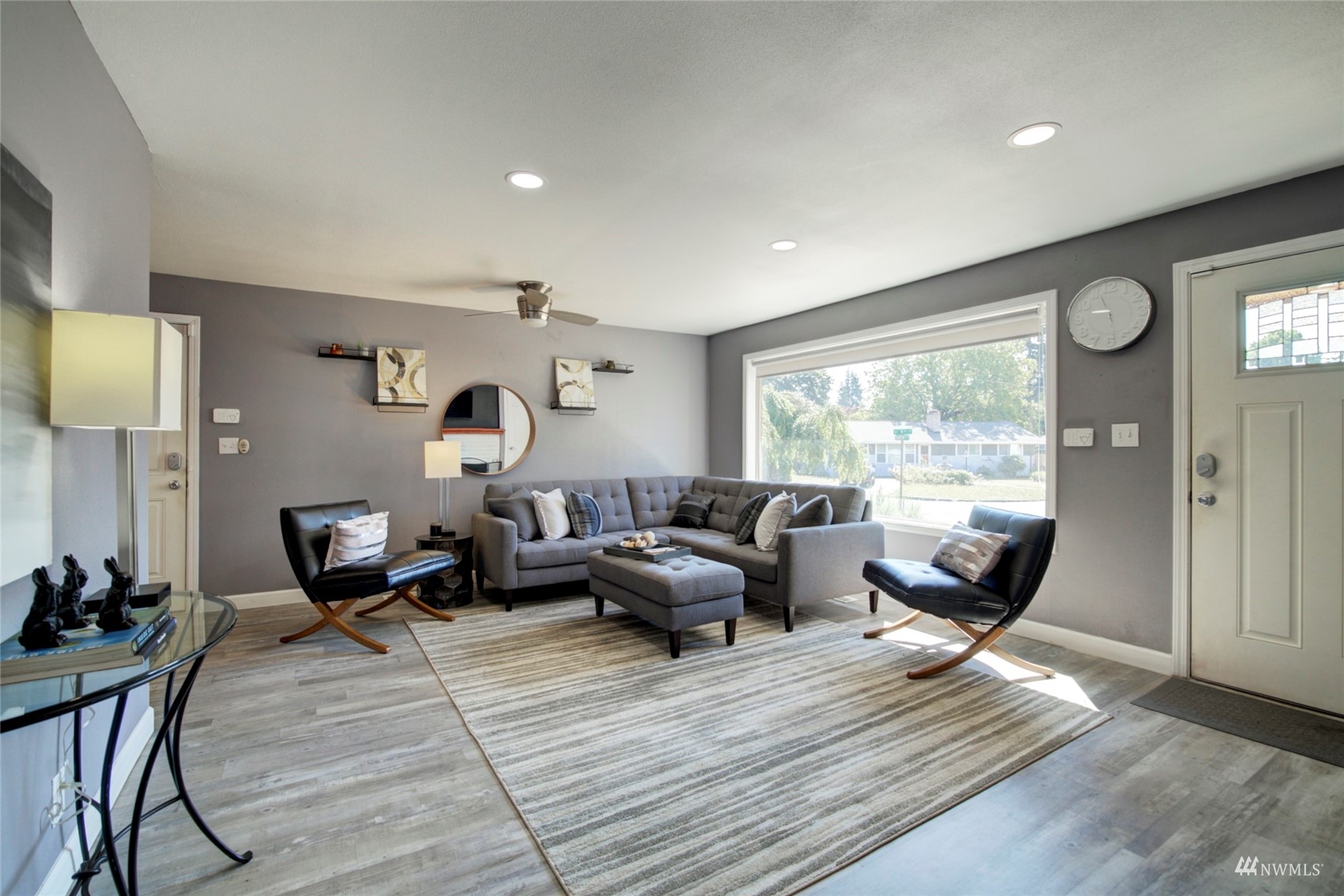 3612 Northeast 9th Street Renton, WA 98056 - Photo 4 of 23 a living room with furniture and a large window