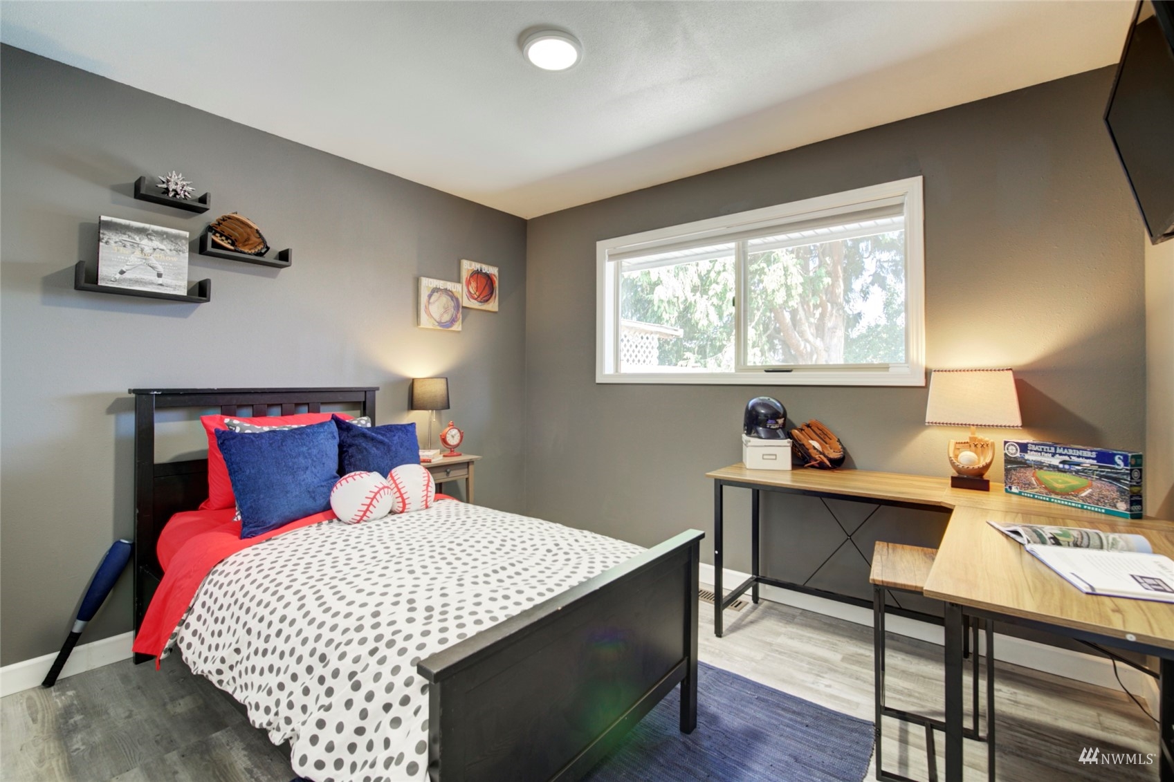 3612 Northeast 9th Street Renton, WA 98056 - Photo 7 of 23 a bedroom with a bed and a desk