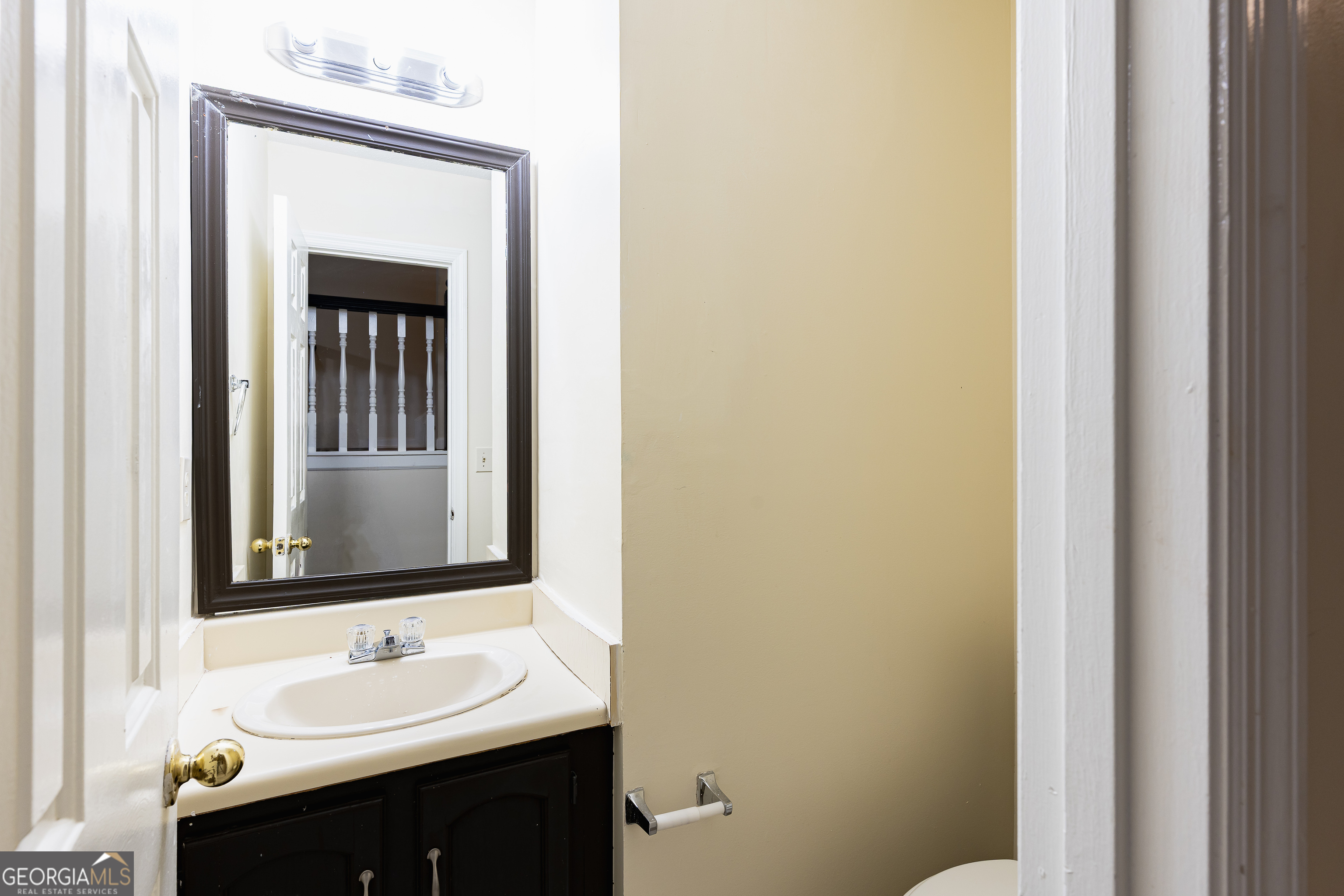 3821 Rex Mill Square Rex, GA 30273 - Photo 7 of 51 a bathroom with a sink and a mirror