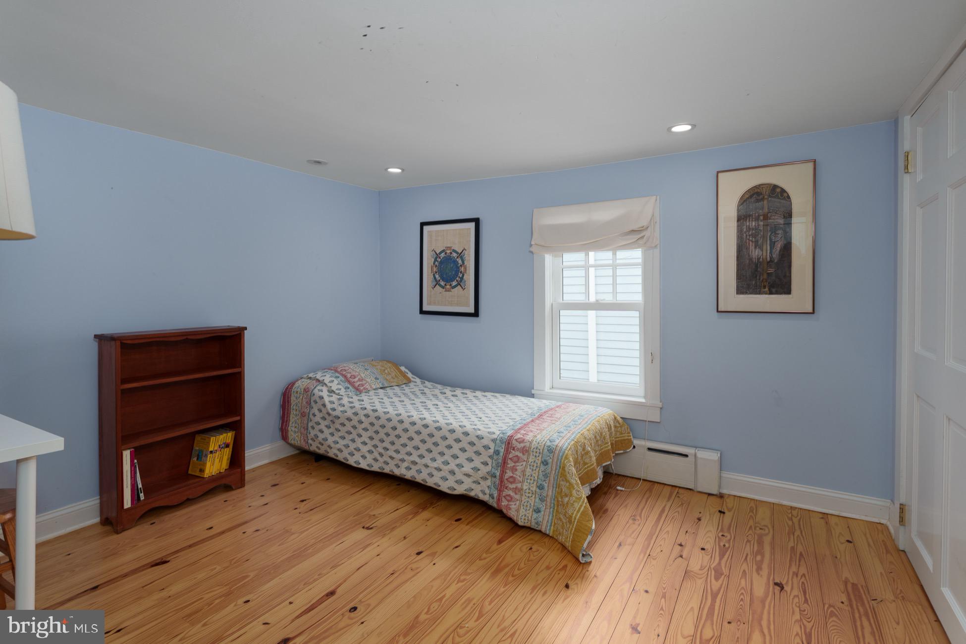 29 Chestnut Street Princeton, NJ 08542 - Photo 13 of 26 a bedroom with a bed and a window