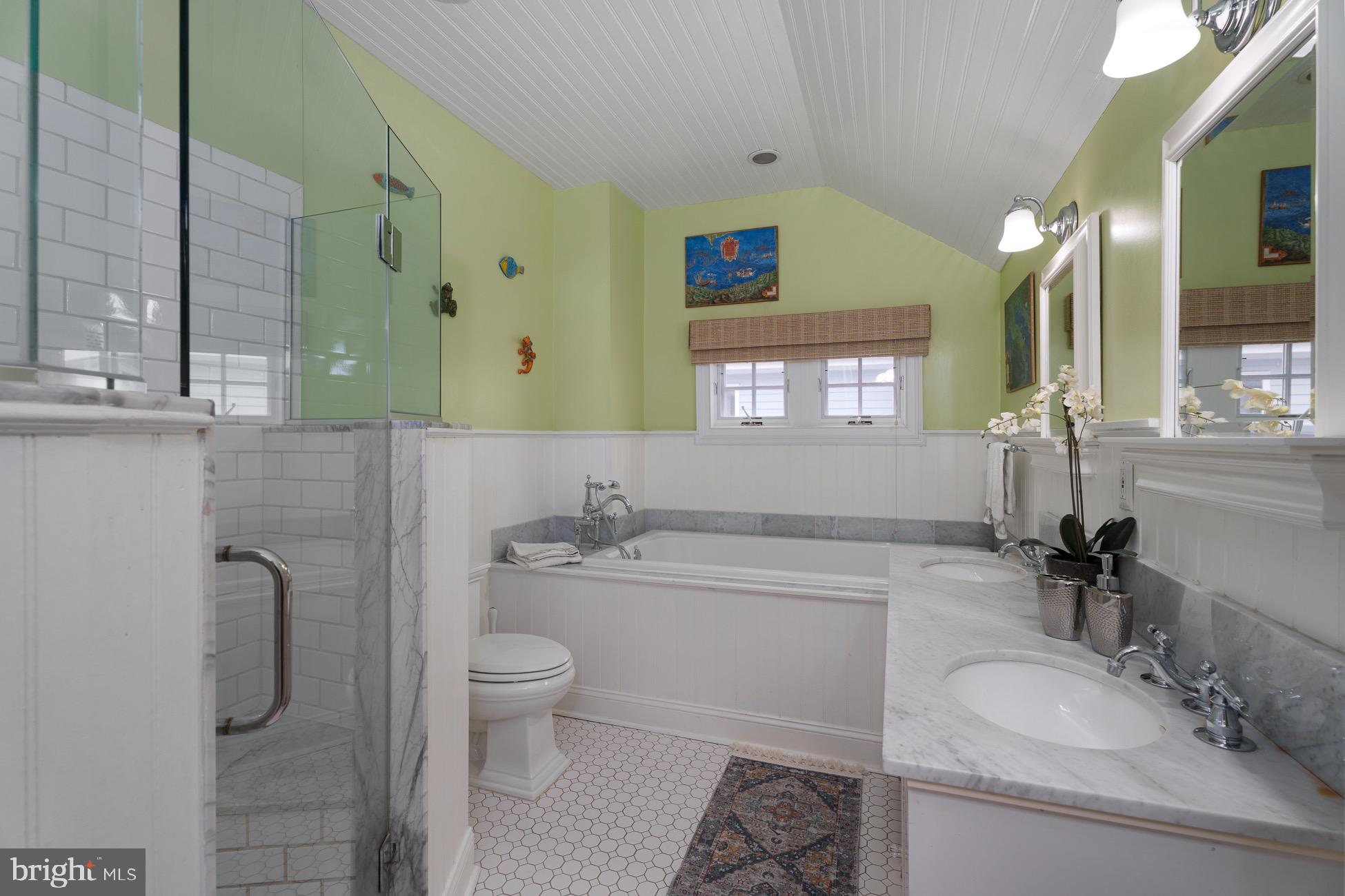 29 Chestnut Street Princeton, NJ 08542 - Photo 15 of 26 a bathroom with a granite countertop sink toilet and mirror