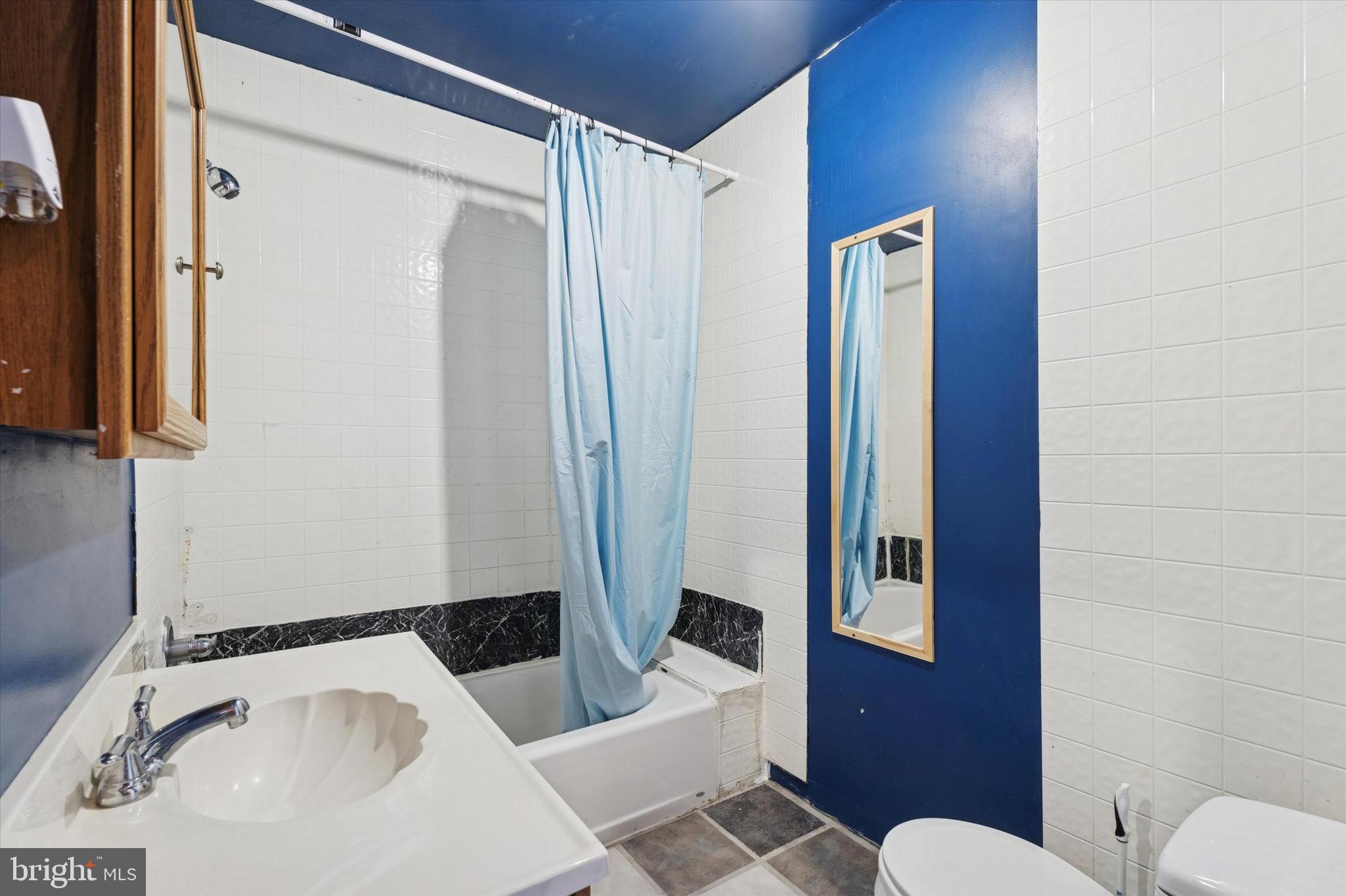 2943 East Walnut Street Colmar, PA 18915 - Photo 15 of 24 a bathroom with a sink and a tub