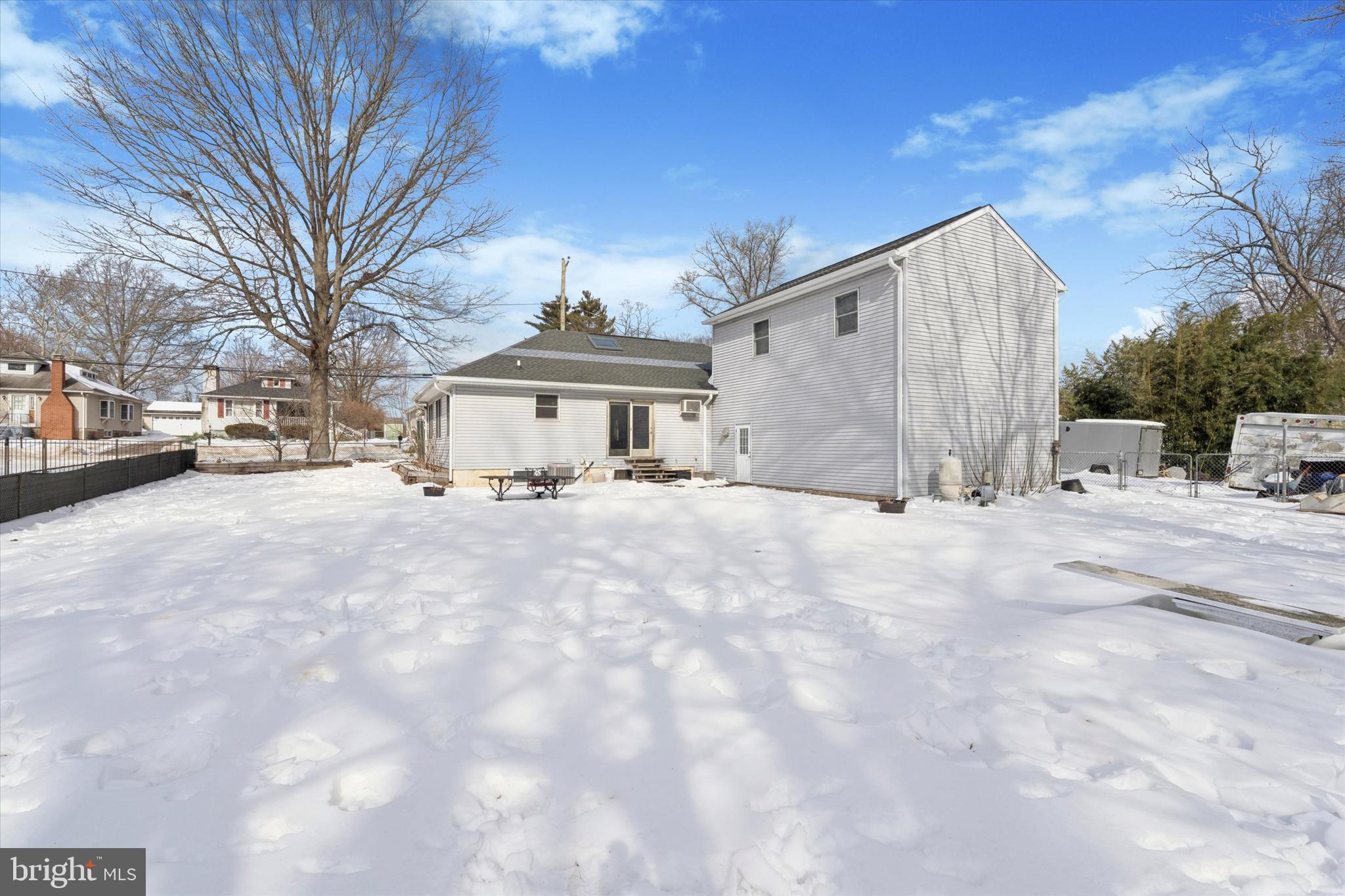 2943 East Walnut Street Colmar, PA 18915 - Photo 22 of 24 a view of a house with a snow in the yard