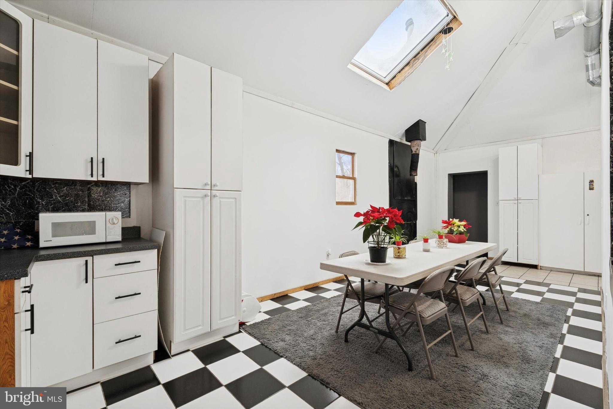 2943 East Walnut Street Colmar, PA 18915 - Photo 10 of 24 a view of a dining room with furniture and wooden floor