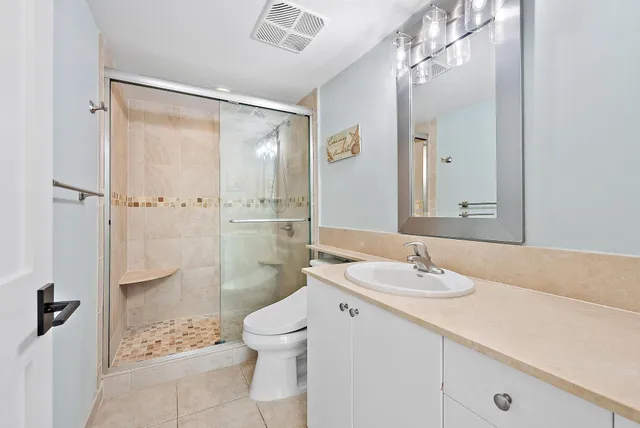 a view of storage and utility room with washer and dryer
