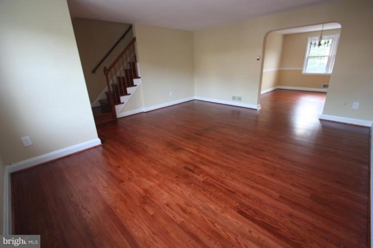 8210 Pleasant Plains Road Towson, MD 21286 - Photo 2 of 30 LIVING ROOM LOOKING INTO THE DINING ROOM