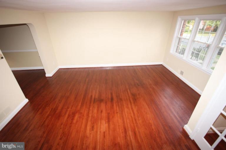 8210 Pleasant Plains Road Towson, MD 21286 - Photo 3 of 30 VIEW OF LIVING ROOM FROM THE STAIRS